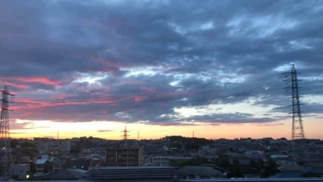 The setting sun lit the clouds bright red